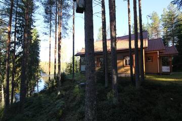 Фото номера Дом с 3 спальнями и видом на реку Дома для отпуска Keskikosken Lomamökit г. Venäjänjärvi 4